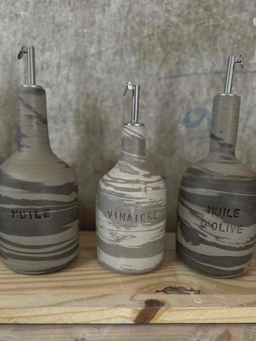 créations de bouteilles par Manon diplômée CAP Tournage en Céramique de YouSchool
